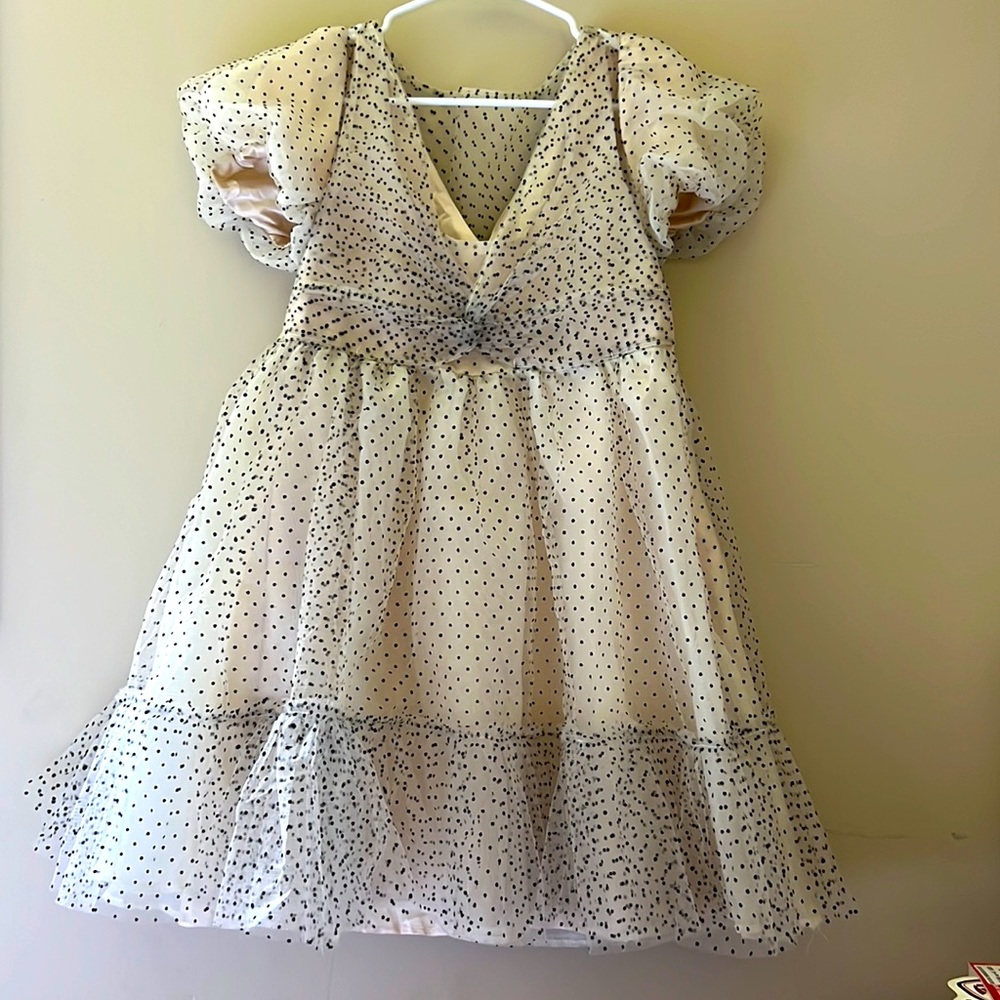 Black and cream tulle ruffle dress with puff sleeves